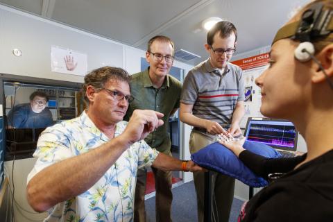Nebraska researchers Steven Barlow, (near left) and Greg Bashford (center) have developed a system to treat stroke victims using a functional transcranial Doppler ultrasound and somatosensory stimulation. The stimulation has been shown in animal models to provide neuroprotection. The technology could prevent brain death. Doctoral students Jacob Greenwood (far left) and Ben Hage (center right) are helping develop the system.